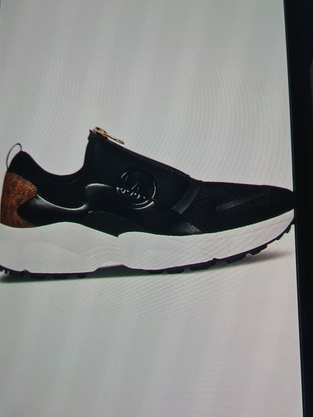 Michael Kors Black and White Slip-On Athletic Sneakers